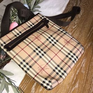 Burberry cross body messenger bag.